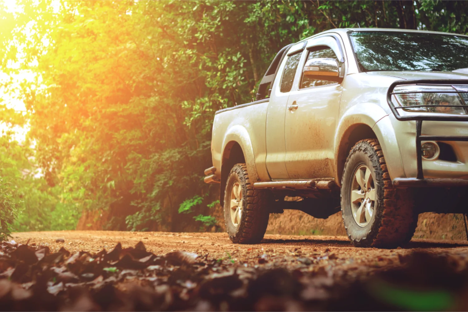 4WD ute on a dirt track in the bush